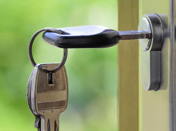 Key in a euro cylinder lock on a front door